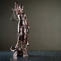 Symbols of law and justice. Themis. Dark rustic background Royalty Free Stock Photo