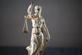 Symbols of law and justice. Themis. Dark rustic background Royalty Free Stock Photo