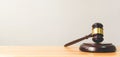 Law and Justice, Legality concept, Judge Gavel on a wood table with background