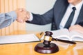 Law and Legal concept, Consultation between attorneys and clients customer shaking hands discussing contract agreement In Royalty Free Stock Photo