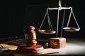 law legal technology concept. judge gavel on computer with scales of justice on desk of lawyer Royalty Free Stock Photo