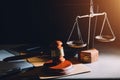 law legal technology concept. judge gavel on computer with scales of justice on desk of lawyer Royalty Free Stock Photo