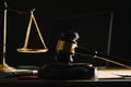 law legal technology concept. judge gavel on computer with scales of justice on desk of lawyer Royalty Free Stock Photo