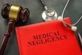 A law about medical negligence and stethoscope. Royalty Free Stock Photo