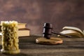 Male lawyer or judge working with contract papers, Law books and wooden gavel on table in courtroom, Royalty Free Stock Photo