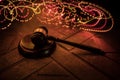 Law theme, mallet of the judge on wooden desk. Law gavel on dark foggy background with light Royalty Free Stock Photo