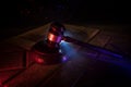 Law theme, mallet of the judge on wooden desk. Law gavel on dark foggy background with light Royalty Free Stock Photo