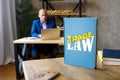 LAW TRADE book in the hands of a attorney. The rise in prominence of trade law following the creation of the World Trade Royalty Free Stock Photo