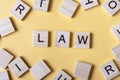 Law word written on wood block. Woodwn abc Royalty Free Stock Photo