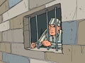 The lawbreaker is in jail. a prisoner in a striped uniform, a dangerous criminal. Escape attempt Royalty Free Stock Photo