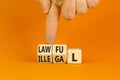 Lawful or illegal symbol. Concept word Lawful or Illegal on wooden cubes. Beautiful orange table orange background. Businessman