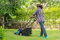 Lawn mover machine cut green grass, Hobby planting home garden Royalty Free Stock Photo