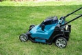 Lawn mover machine cut green grass, Hobby planting home garden Royalty Free Stock Photo