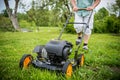 Lawn mover and man Royalty Free Stock Photo