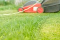 Lawn mower is cleaned from a grass/lawn mower is cleaned from a Royalty Free Stock Photo