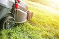 Lawn mower cutting grass. Gardening concept background. Close up of lawn mowers Royalty Free Stock Photo