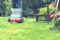 Lawn mower mower grass equipment mowing gardener care work tool Royalty Free Stock Photo