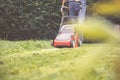 Lawn mower mower grass equipment mowing gardener care work tool Royalty Free Stock Photo