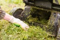 Lawn mower. Mow the lawn with a lawn mower. Royalty Free Stock Photo