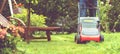 Lawn mower mower grass equipment mowing gardener care work tool Royalty Free Stock Photo