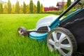 Lawn mowers close-up on a sunny day. Grass care. Gardening concept
