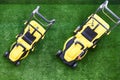 Lawn mowers on the grass Royalty Free Stock Photo