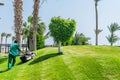 Lawn mowing, Steigenberger AL Dau Golf Course Royalty Free Stock Photo