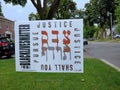 Lawn sign with Hebrew biblical quote about pursuing justice, Jewish support for Black Lives Matter