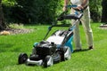 Lawnmower in action Royalty Free Stock Photo