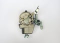 The lawnmower carburetor is a device for supplying a spark-ignition engine with a mixture of fuel and air. Royalty Free Stock Photo