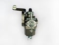 The lawnmower carburetor is a device for supplying a spark-ignition engine with a mixture of fuel and air. Royalty Free Stock Photo