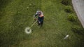 The lawnmower man mows the lawn the view from the top Royalty Free Stock Photo