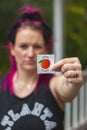 A Georgia voter displays her I Voted sticker after voting in the 2020 Presidential Election Royalty Free Stock Photo