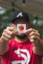 A Georgia voter holds up his I Voted sticker after voting in the 2020 Presidential Election Royalty Free Stock Photo