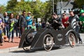 Team Dressed Like Batman Characters Push Bed In Fundraiser Event