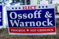 LAWRENCEVILLE, UNITED STATES - Dec 22, 2020: Georgia Senate runoff election signs along the side of the road near a polling