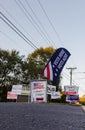 LAWRENCEVILLE, UNITED STATES - Nov 03, 2020: Campaign signs along the side of the road near a polling location in Gwinnett County