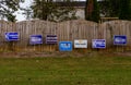 LAWRENCEVILLE, UNITED STATES - Nov 03, 2020: Democratic campaign signs along the side of the road near a polling location in