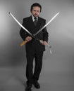 Lawyer, Aggressive businessman with Japanese swords in defensive Royalty Free Stock Photo