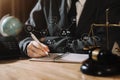 Lawyer business man working with paperwork on his desk in office . Royalty Free Stock Photo