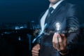 A lawyer or businessman showing light bulb burning inside the paragraph Royalty Free Stock Photo