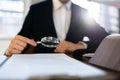 Lawyer Examining Paper Using Magnifier Glass Royalty Free Stock Photo