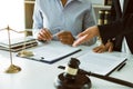 Lawyer is explaining about the wrongdoing laws regarding fraud to the client at the office Royalty Free Stock Photo