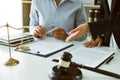 Lawyer is explaining about the wrongdoing laws regarding fraud to the client at the office Royalty Free Stock Photo