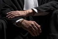 Lawyer in gown with jabot hands close up judge