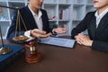 Lawyer hand concept justice with judge gavel, Businessman in suit or Hiring lawyers in the digital system. legal law Royalty Free Stock Photo