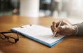 Lawyer hand showing paperwork for signing, agreement contract and settlement offer in law firm office. Closeup of legal