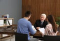 Lawyer having meeting with young couple Royalty Free Stock Photo