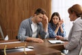 Lawyer having meeting with young couple Royalty Free Stock Photo