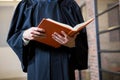 Lawyer holding a law book